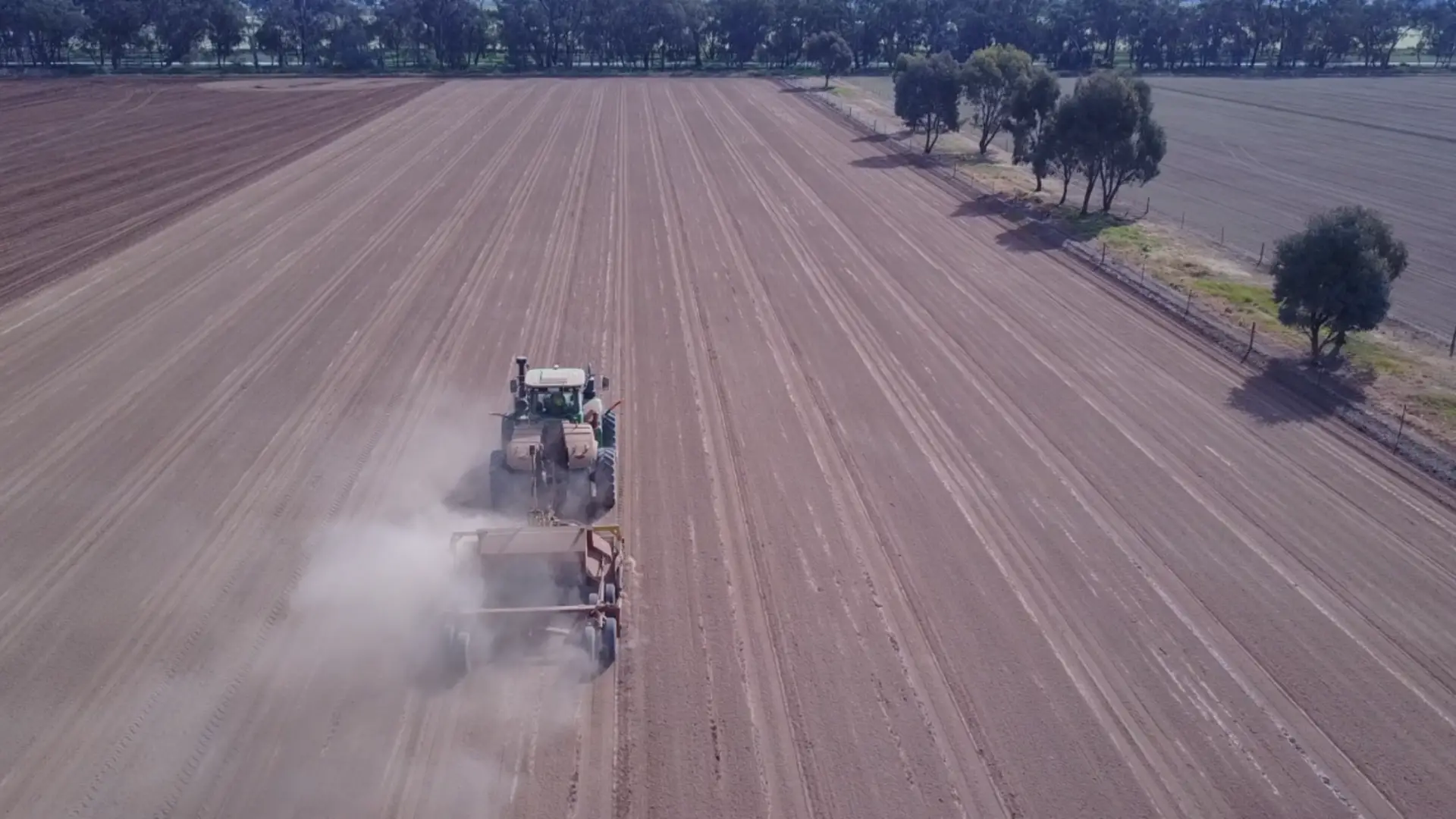 Aerial view of a tractor landforming a paddock